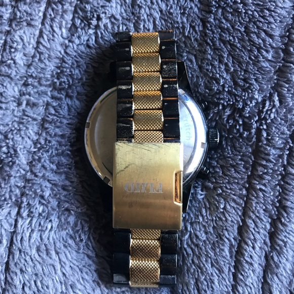 Black and gold Flud watch - Picture 2 of 3